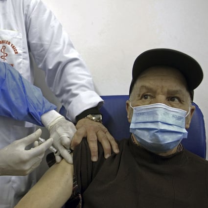 A man is administered with Russia’s Sputnik V vaccine in Algiers on February 3, 2021. Photo: AP