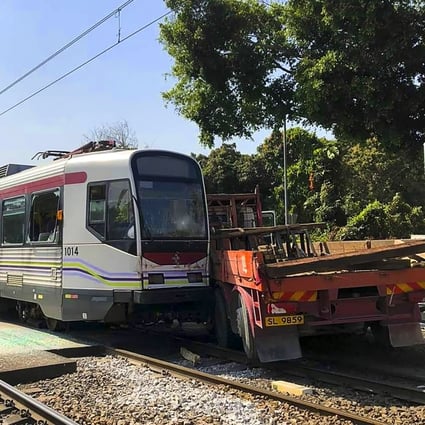 Twenty-two people were injured in a collision between a light rail train and a truck in northern Hong Kong on Thursday. Photo: Facebook