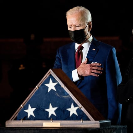 US President Joe Biden and First Lady Jill Biden pay their respects to the late Capitol Police Officer Brian Sicknick on Wednesday. Photo: EPA-EFE