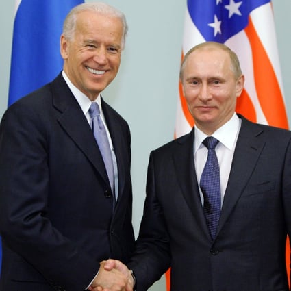Joe Biden, then US vice-president, and Vladimir Putin meet in Moscow in March 2011. Photo: AFP