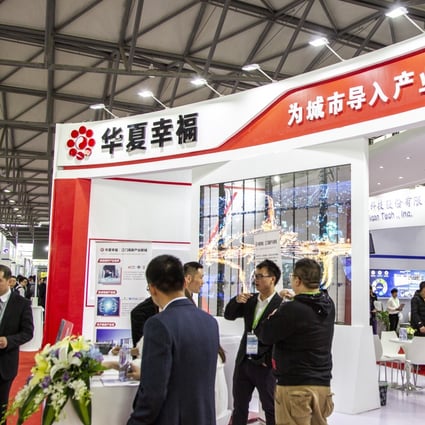 The stand of China Fortune Land Development at an expo in Shanghai in March 2019. Photo: AFP