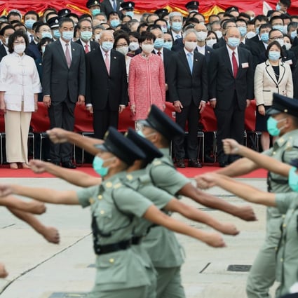 Chief Executive Carrie Lam (centre, in pink) and other top government officials attend the National Day flag-raising ceremony at Golden Bauhinia Square in Wan Chai on October 1 last year. In the wake of the 2014 Occupy protests, Lam’s election in 2017 failed to heal the rifts in society. Photo: Nora Tam