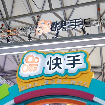 The name and logo of Kuaishou are seen at a booth at a gaming expo in Shanghai, China on August 2, 2019.