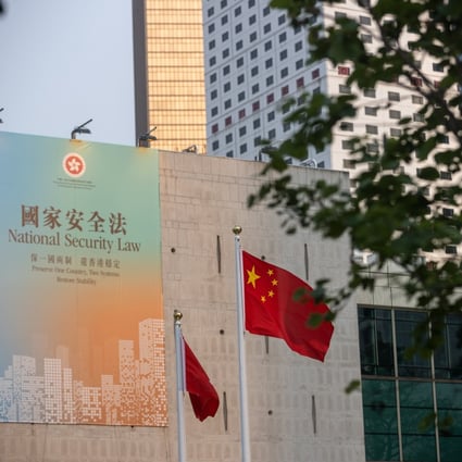 A poster promoting the national security law is displayed on Hong Kong City Hall on September 5. Photo: EPA-EFE