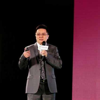 Recon Group CEO Tony Xia attends a news conference after taking control of English football club Aston Villa in 2016. Photo: Reuters