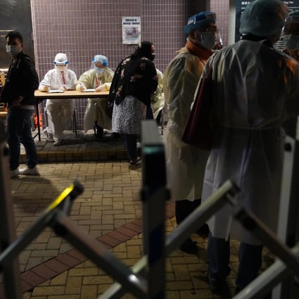 A mobile testing centre is set up for residents of Hoi Yu House in Mong Kok. Photo: Winson Wong