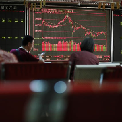 Electronic boards showing stock index and prices at a brokerage in Beijing. Photo: EPA-EFE