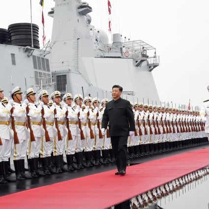 Chinese President and Central Military Commission Chairman Xi Jinping inspects a navy honour guard before boarding the destroyer Xining at a pier in Qingdao, in China’s eastern Shandong province in April 2019. Photo: Xinhua