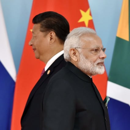 Chinese President Xi Jinping and Indian Prime Minister Narendra Modi may hold the key to moving forward from their countries’ border dispute. Photo: AFP