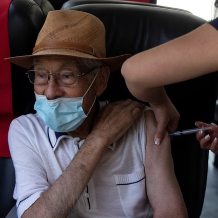 A nurse vaccinates a patient against Covid-19 at a mobile vaccination post in Santiago, Chile on Monday. In addition to the Sinovac shot, Chile has approved those from Pfizer and AstraZeneca. Photo: EPA-EFE