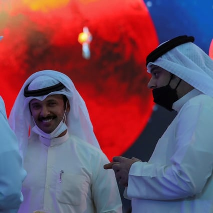 Attendees talk during an event in Dubai on Tuesday to celebrate the Hope probe entering Mars orbit. Photo: Reuters