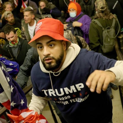 A group of Trump supporters enters the US Capitol building in January. Photo: TNS