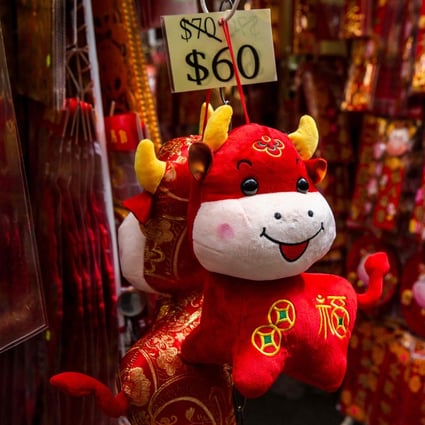 An ox soft toy displayed for sale at a market in Hong Kong on February 11, the eve of the Lunar New Year. Photo: AFP