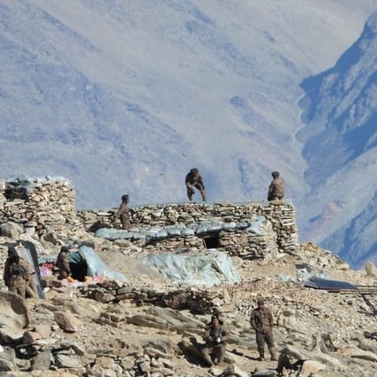 This photograph, provided by the Indian Army, purports to show Chinese troops dismantling their bunkers at Pangong Tso in Ladakh along the India-China border on Monday. China and India are pulling back frontline troops from disputed parts of their mountain border. Photo: Indian Army via AP