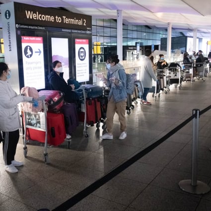 Passengers queue to enter the departures area at Heathrow Airport in London last December. Photo: Xinhua