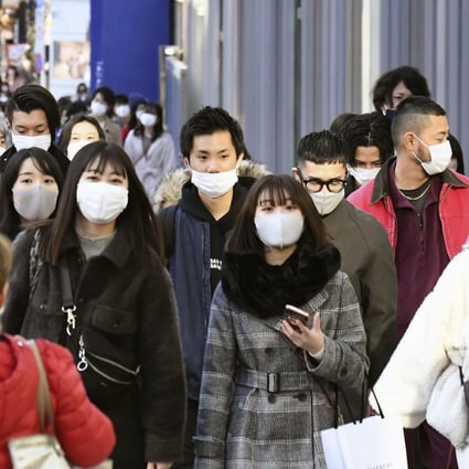 Japan’s government is raising surveillance against mutant varieties as they may be more resistant to vaccines. Photo: Kyodo News via AP