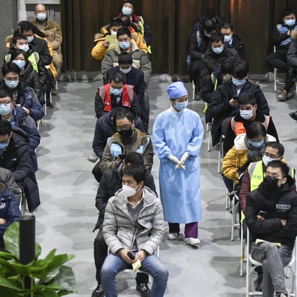 People are monitored for any reactions after receiving coronavirus vaccine shots in Beijing last month. Photo: Kyodo