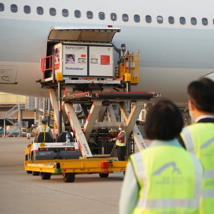 A Cathay Pacific flight lands in Hong Kong with the first 1 million doses of Covid-19 vaccine for the city’s vaccination programme. Photo: Handout