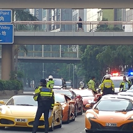 Officers intercepted 45 cars on Gloucester Road, Wan Chai, on Sunday morning. Photo: Facebook