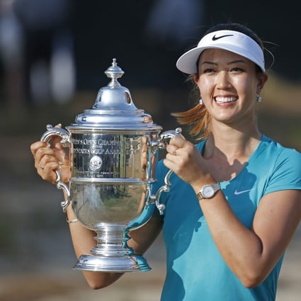 Michelle Wie poses with the trophy after winning the 2014 US Open. This was the same year Rudy Giuliani referenced in his story. Photo: AP