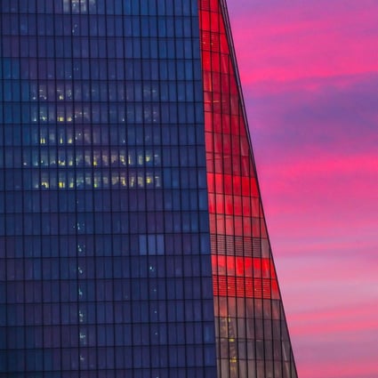 The headquarters of the European Central Bank in Frankfurt, Germany, is seen at sunrise on February 18. Brussels and the ECB are under pressure to keep the stimulus spigots wide open, but Germany remains committed to a much more cautious road map ahead. Photo: AFP