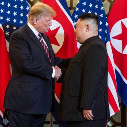 US President Donald Trump shakes hands with North Korea's leader Kim Jong-un before a meeting in Hanoi in 2019. Photo: AFP