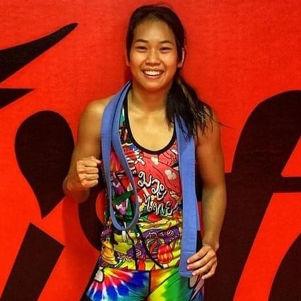ONE Championship Muay Thai fighter Wondergirl Fairtex shows off her new blue belt. Photo: Instagram