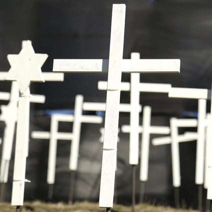 White crosses representing Covid-19 in California’s Nevada County are seen at a memorial in Grass Valley in January. Photo: The Union via AP