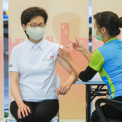 Carrie Lam receives the Sinovac jab at the community vaccination centre in Hong Kong’s Central Library. Photo: Sam Tsang