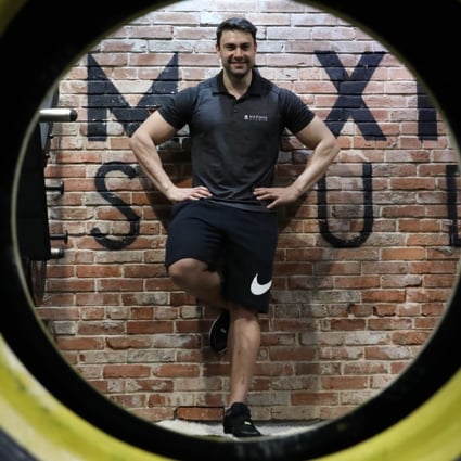 Jeff Basso, the director and a personal trainer at Maximus Studio, said go slow when getting back in shape to play your sport of choice. Photo: Nora Tam