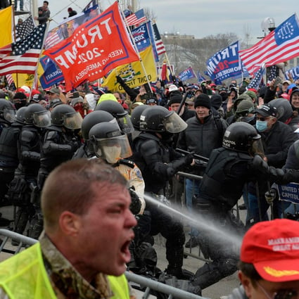 Trump supporters clash with police and security forces at the storming of the US Capitol on January 6. Photo: AFP