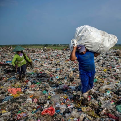 Collecting plastic waste at the Sidoarjo garbage dump in East Java, Indonesia. Photo: AFP