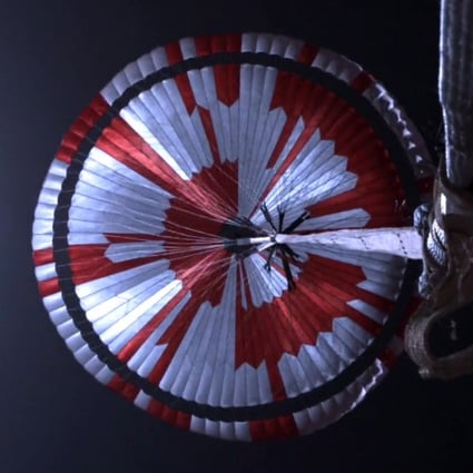 The Mars Perseverance rover’s parachute is deployed during the descent stage of the vehicle’s landing on the red planet on Thursday. Photo: EPA-EFE