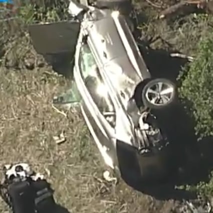 A vehicle rest on its side after a rollover accident involving golfer Tiger Woods in Los Angeles on Tuesday. Photo: KABC-TV via AP