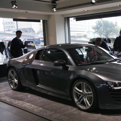 People visit an Audi showroom in Admiralty. Tax and licensing fees for private vehicles shot up on Wednesday. Photo: Dickson Lee
