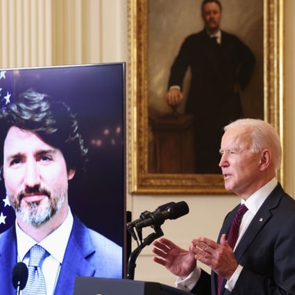 US President Joe Biden and Canadian Prime Minister Justin Trudeau hold their first bilateral meeting, by video link. Photo: Reuters