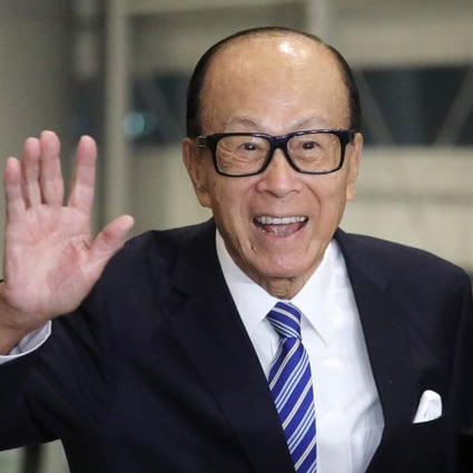 Li Ka-shing with his son Victor Li Tzar-kuoi. Li was back on top as Hong Kong’s richest man in the latest Forbes list. Photo: Dickson Lee