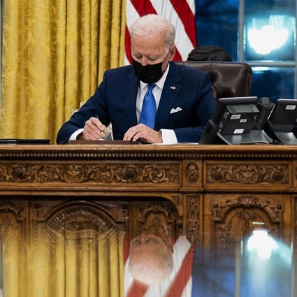 Biden lifts Trump ban on green cards, saying legal ...