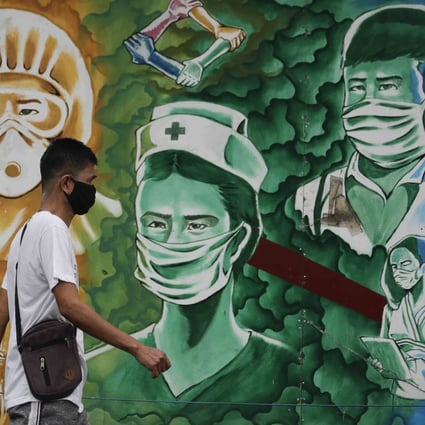 A mural outside the Mission Hospital in Pasig City, Philippines. Photo: AP