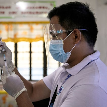 A health worker in Metro Manila participates in a simulation for the Philippines’ Covid-19 vaccination drive. Photo: Reuters