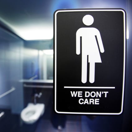Signs for transgender bathroom access are becoming more common, at least in the West. Photo: Reuters