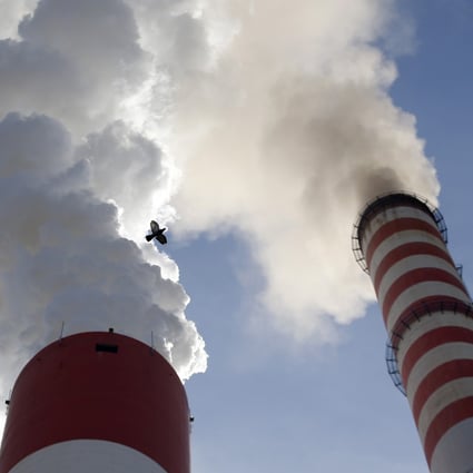 Smoke rises from the chimneys of a coal-fired power station. More than half of Vietnam’s energy needs are met by coal-fired power stations Photo: AP