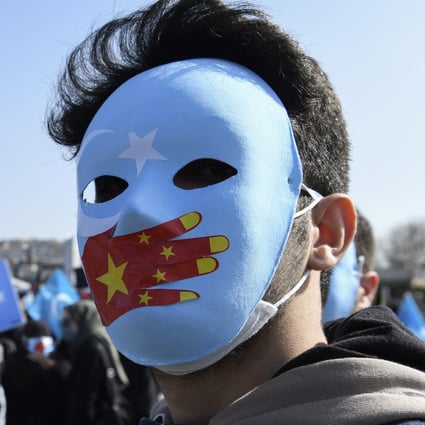 A member of the Uygur community living in Turkey joins an anti-China protest in Istanbul on Friday. Photo: AP