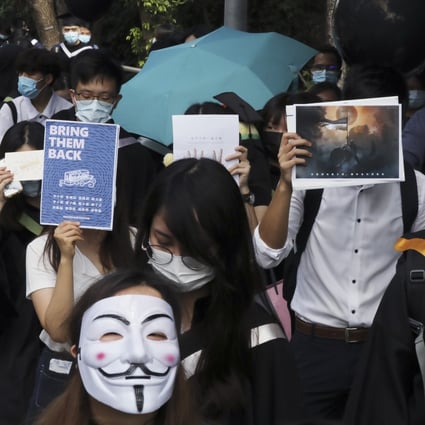Graduates of Chinese University march in November calling for 12 Hongkongers detained on the mainland to be returned. Photo: K. Y. Cheng