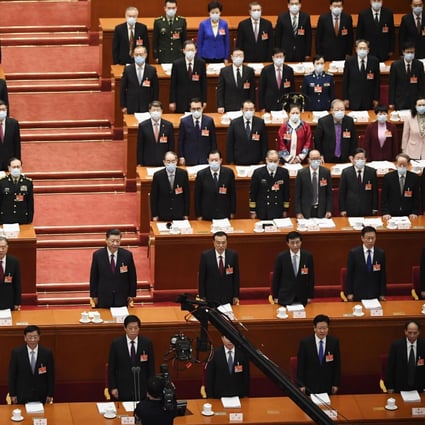 Participants sing the Chinese national anthem at the opening ceremony of the National People's Congress at the Great Hall of the People in Beijing on March 5, 2021. President Xi Jinping is in the centre. Photo: Kyodo