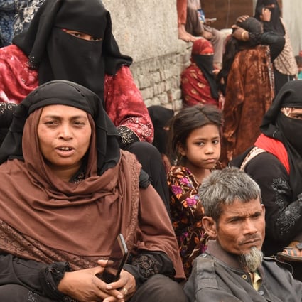 Rohingya Muslims from Myanmar gather outside a mosque on Sunday in Jammu city. At least 168 of their number face possible deportation back to Myanmar. Photo: EPA-EFE