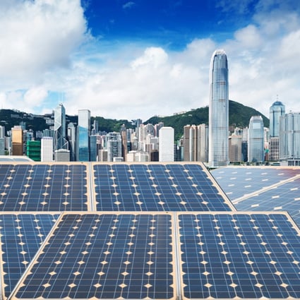 Solar panels and the Hong Kong skyline. Photo: Shutterstock