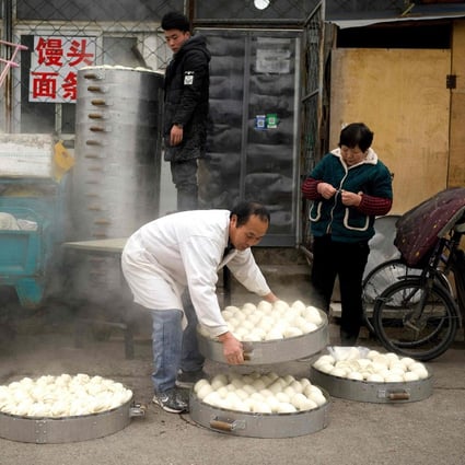 As part of the support to China’s legions of small-scale taxpayers, including caterers, street vendors, travel agents and transport firms, the value-added tax (VAT) threshold will be raised from 100,000 yuan (US$15,400) to 150,000 yuan of monthly sales. Photo: AFP