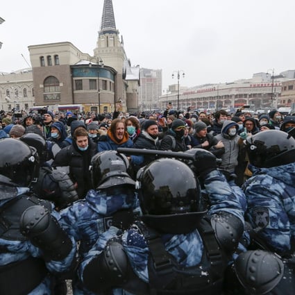 People clash with police during a protest against the jailing of opposition leader Alexei Navalny in Moscow, on January 31, 2021. The January protests were the largest outpouring of discontent in years and appeared to have rattled the Kremlin. Police reportedly arrested about 10,000 people. Photo: AP Photo