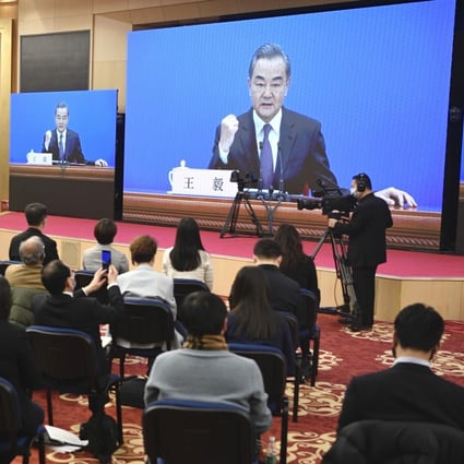 Foreign Minister Wang Yi holds a press conference on the sidelines of the National People’s Congress on Sunday. Photo: Kyodo